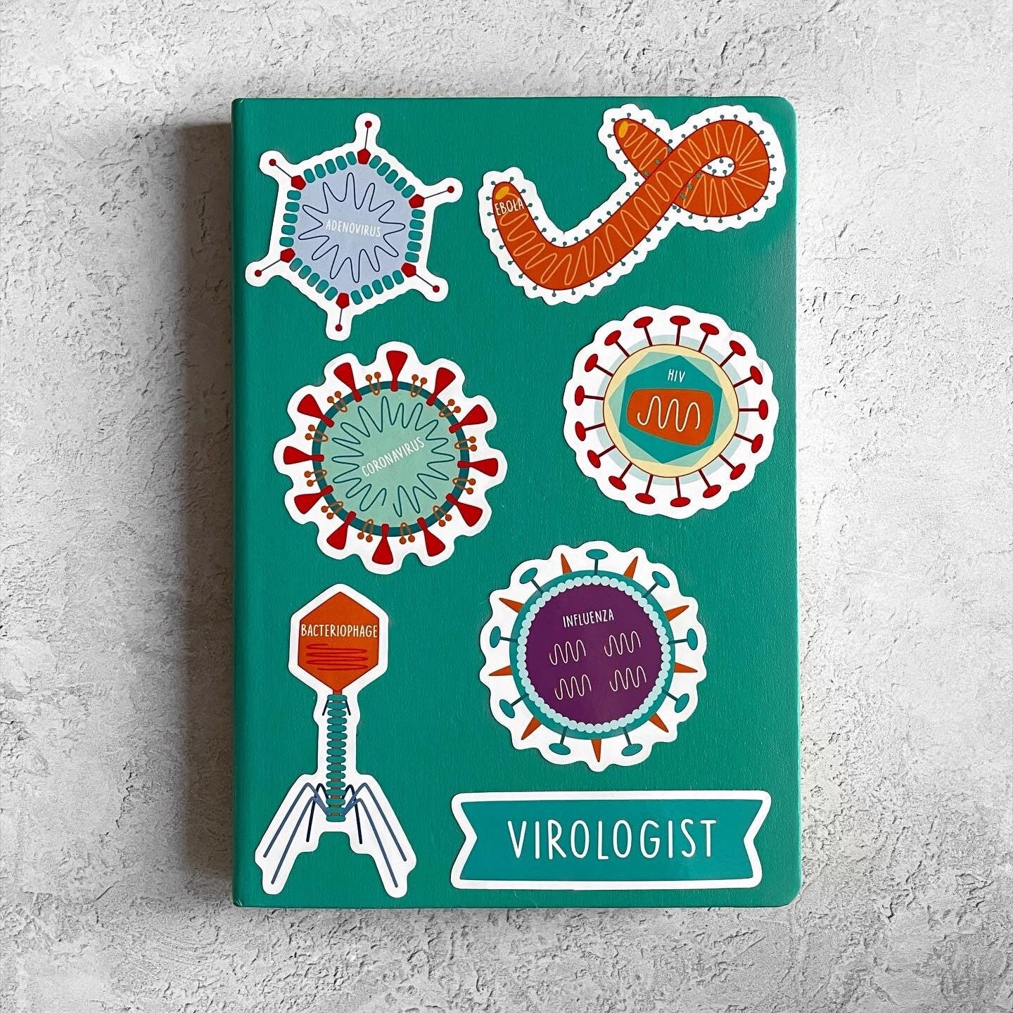 Notebook cover with colorful illustrations of viruses and the word 'Virologist' on a teal background.