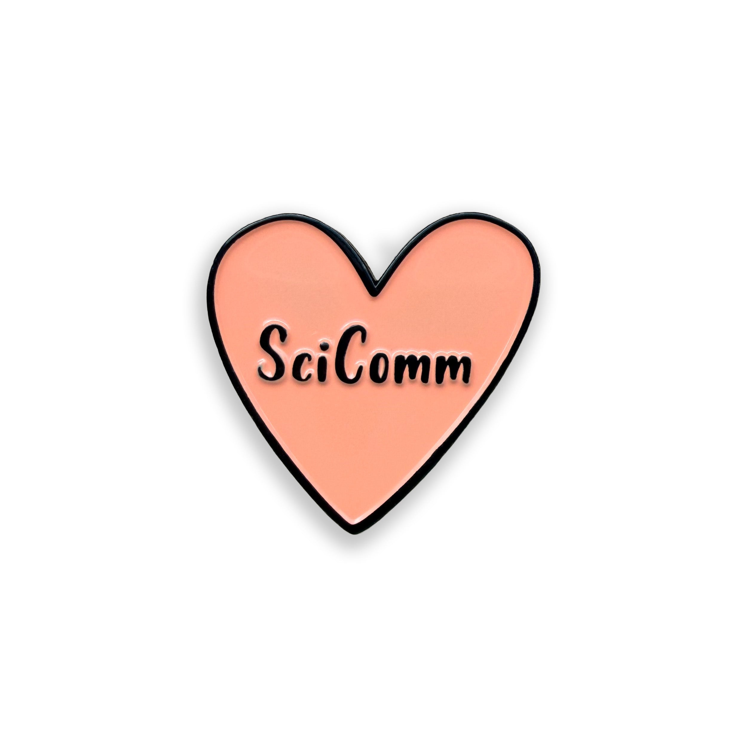 Heart-shaped pin with 'SciComm' text on a white background