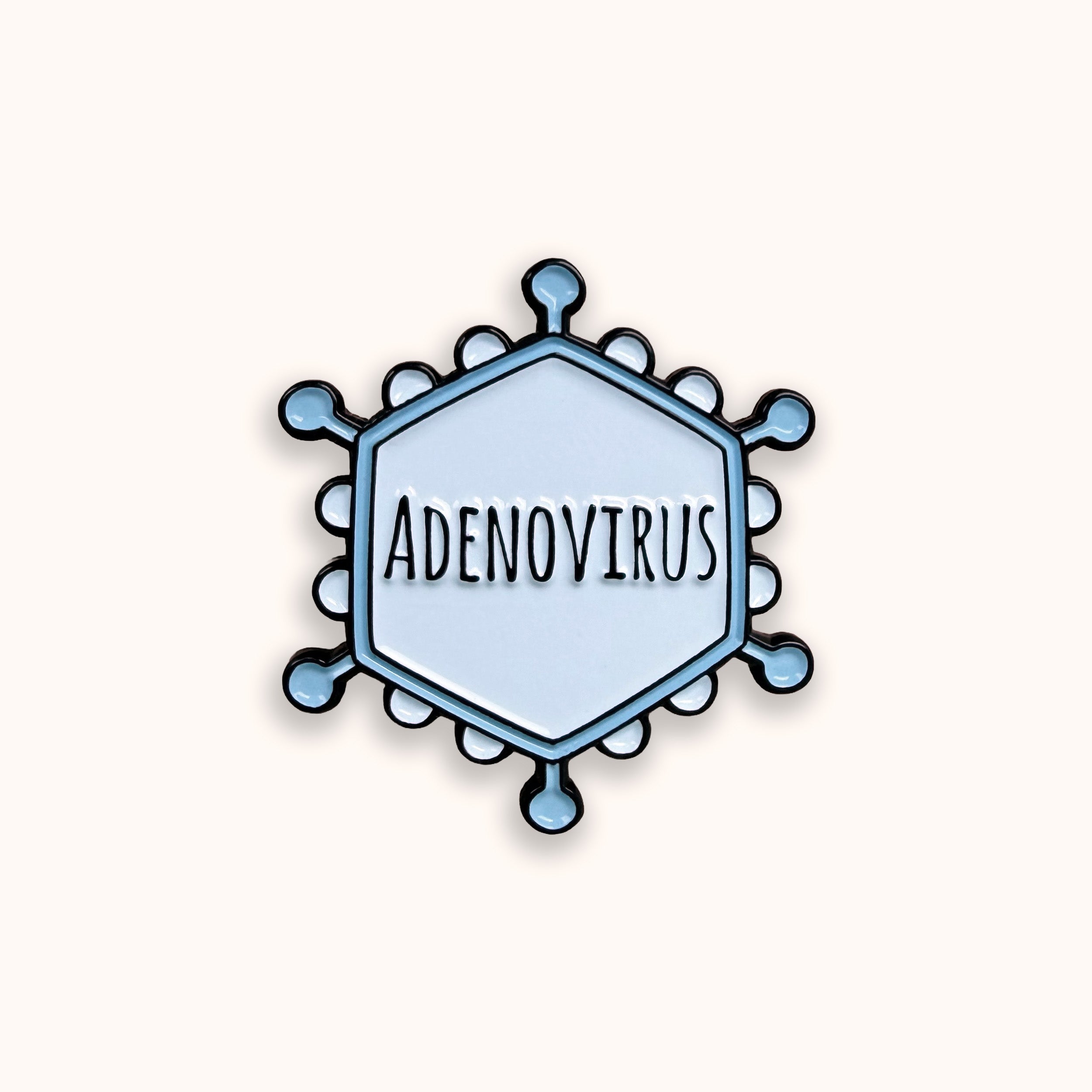 Illustration of an adenovirus particle with 'ADENOVIRUS' text on a white background