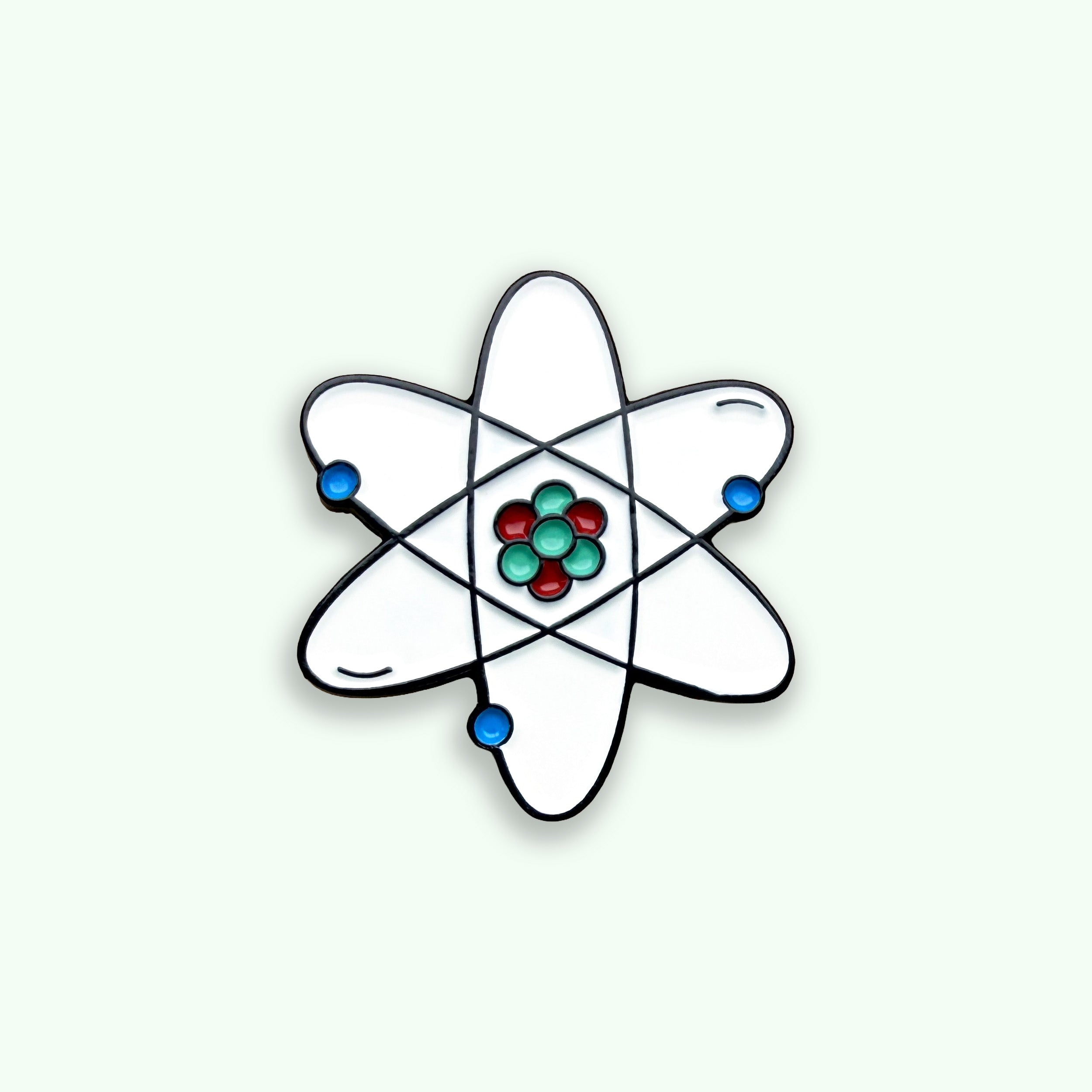 Simplified atom model with colored particles on a light gray background