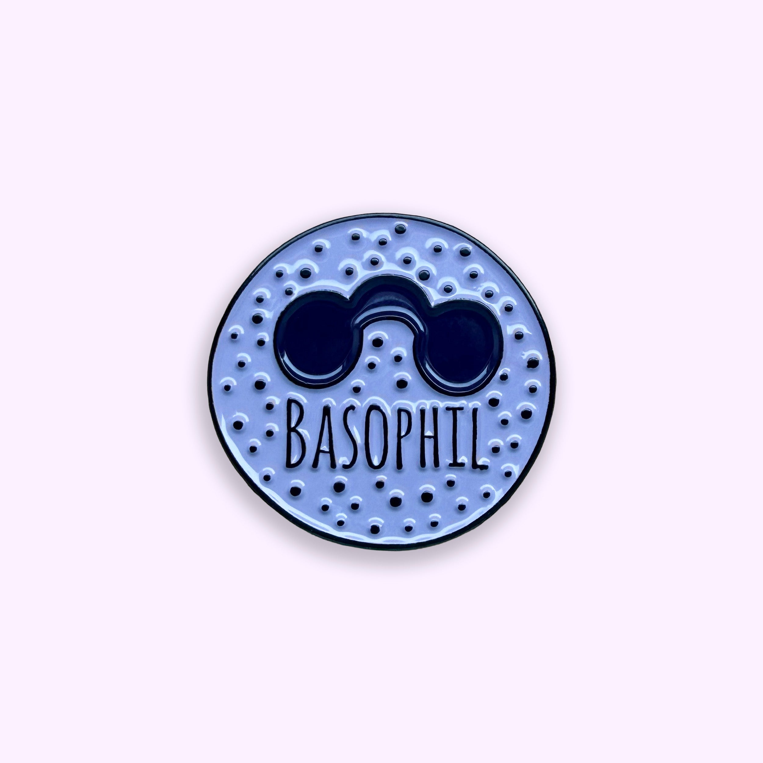 Round blue and black object with 'Basophil' text on a light purple background