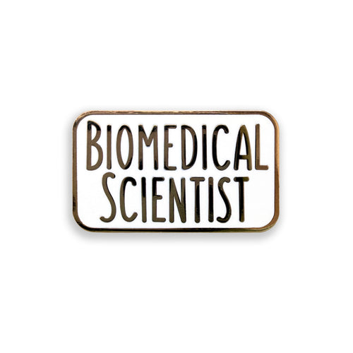 Enamel pin with 'BIOMEDICAL SCIENTIST' text on a white background
