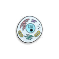 Pin with a colorful diagram of a cell on a white background