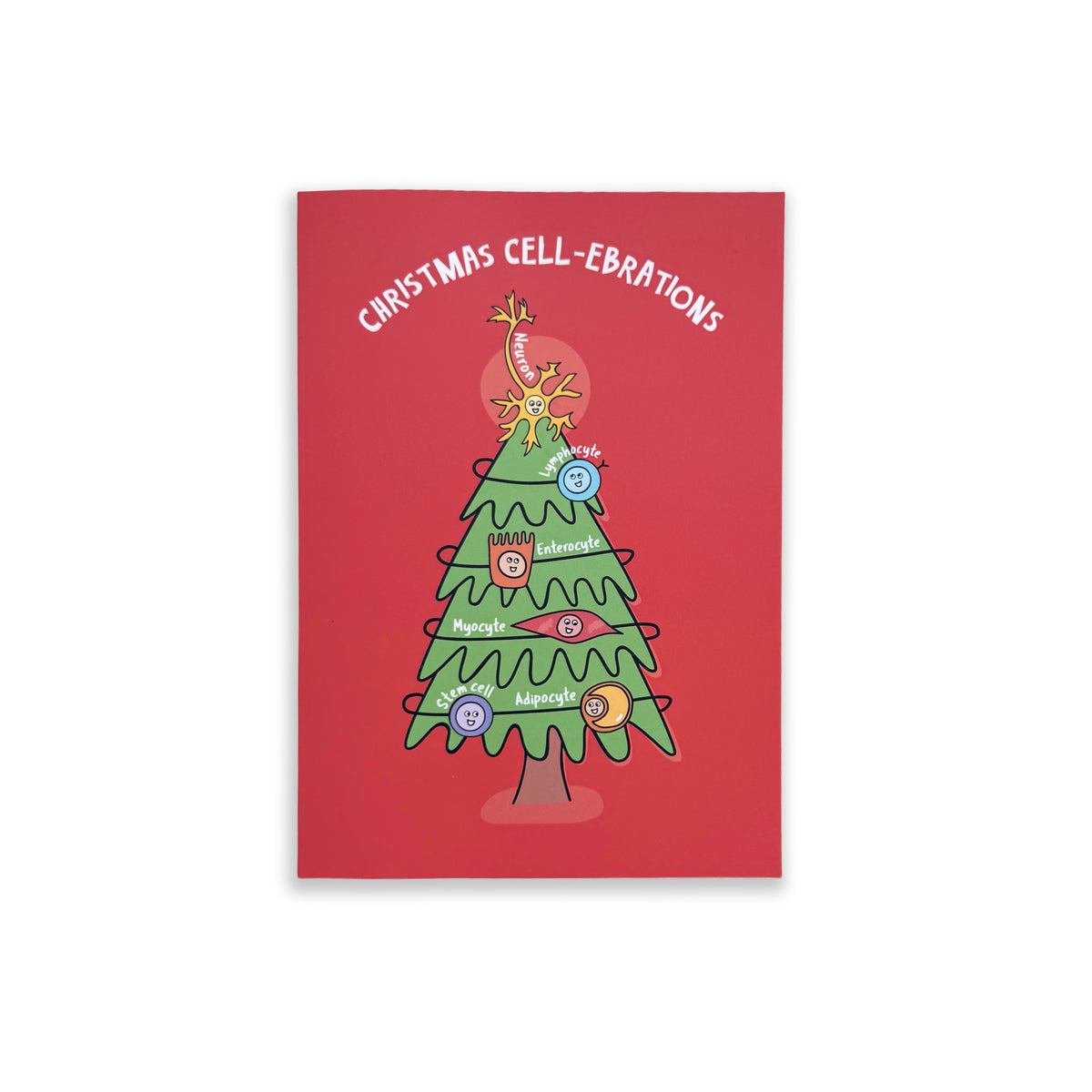 A red rectangular art print or card featuring a cartoon Christmas tree with the text 'CHRISTMAS CELL-EBRATIONS' above it. The tree is green with small colorful ornaments and labels, shown centered on a light gray background.