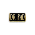 Back and gold enamel pin with the word 'Dr, PHD' on it