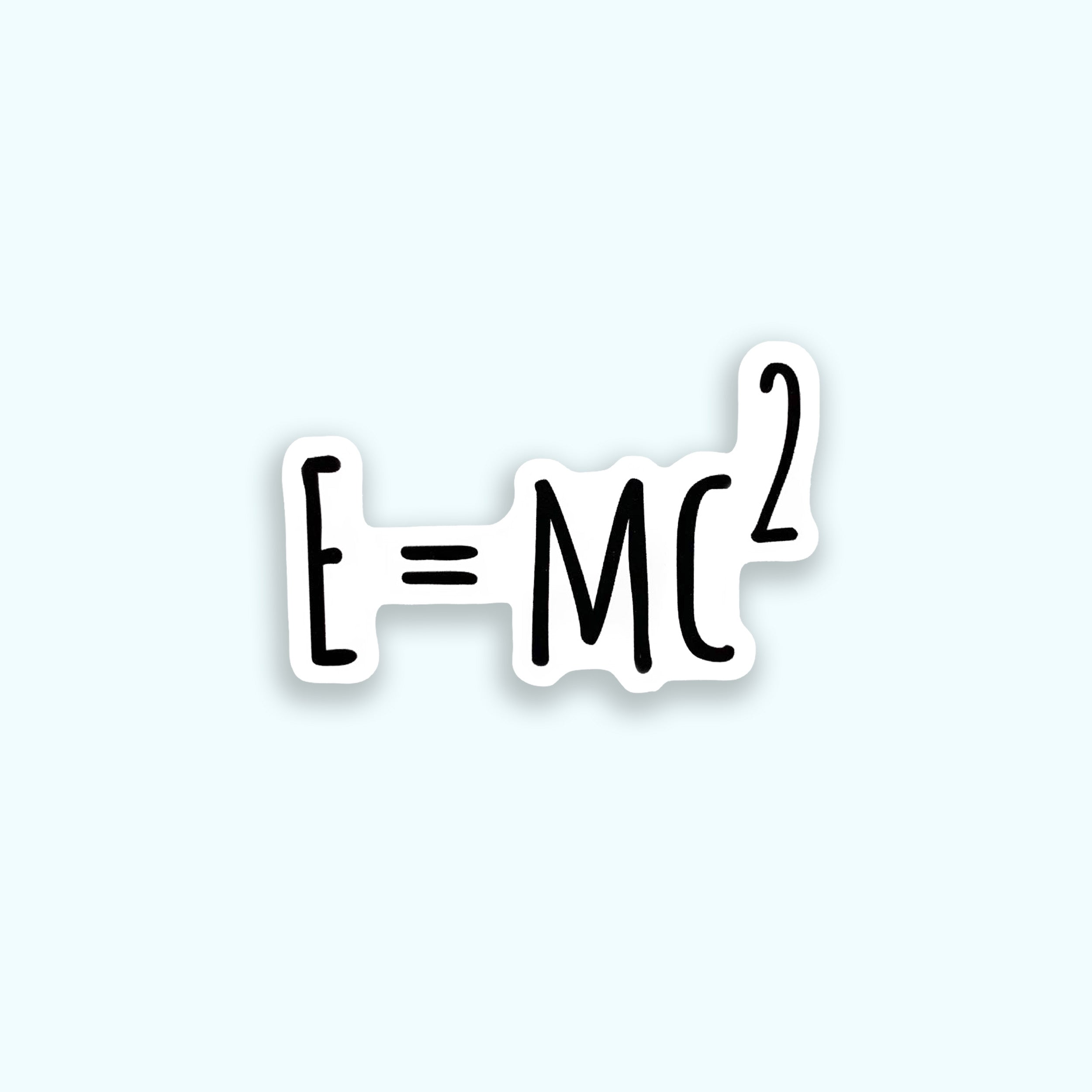 Einstein's equation 'E=MC^2' on a light blue background