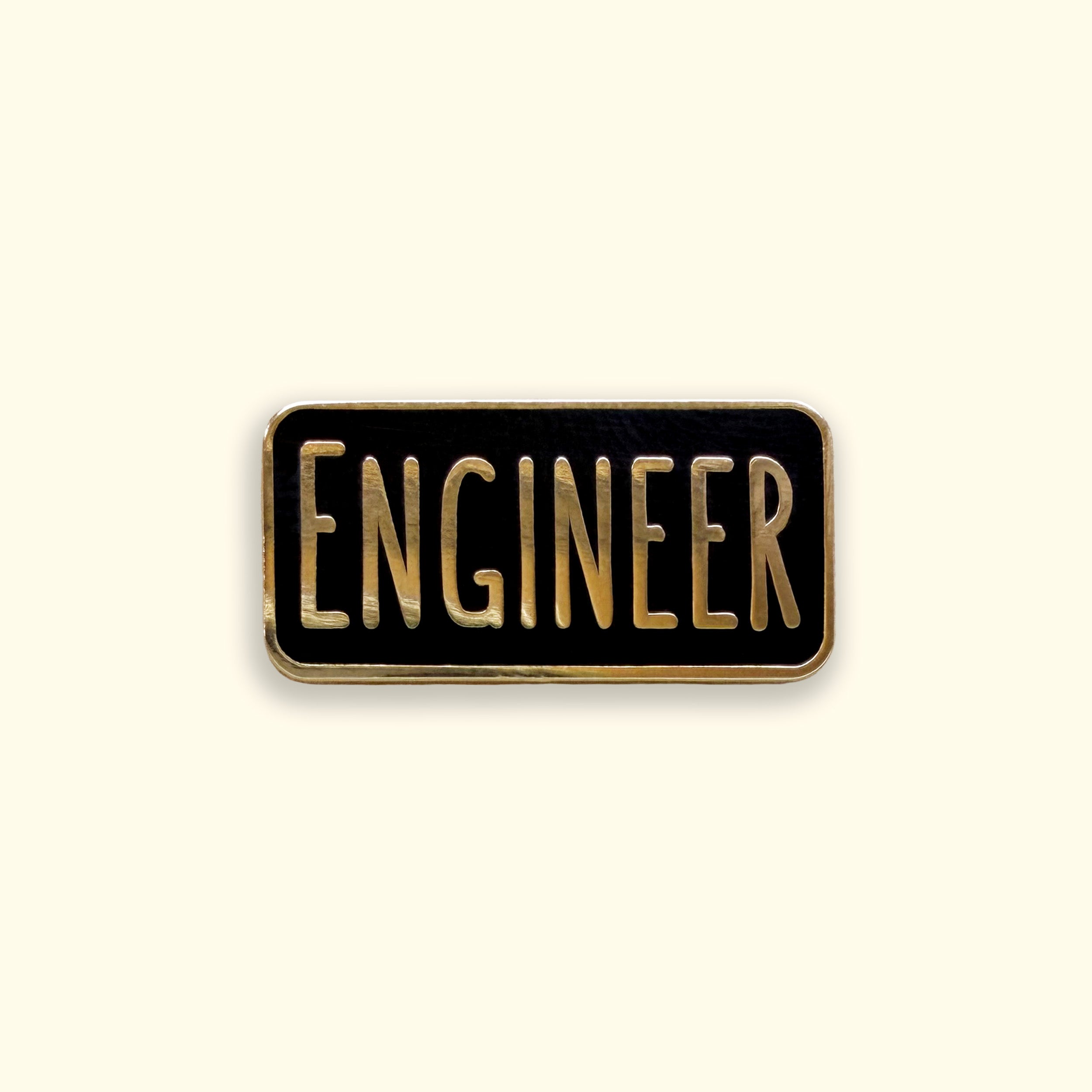 Engineer enamel pin badge on yellow background