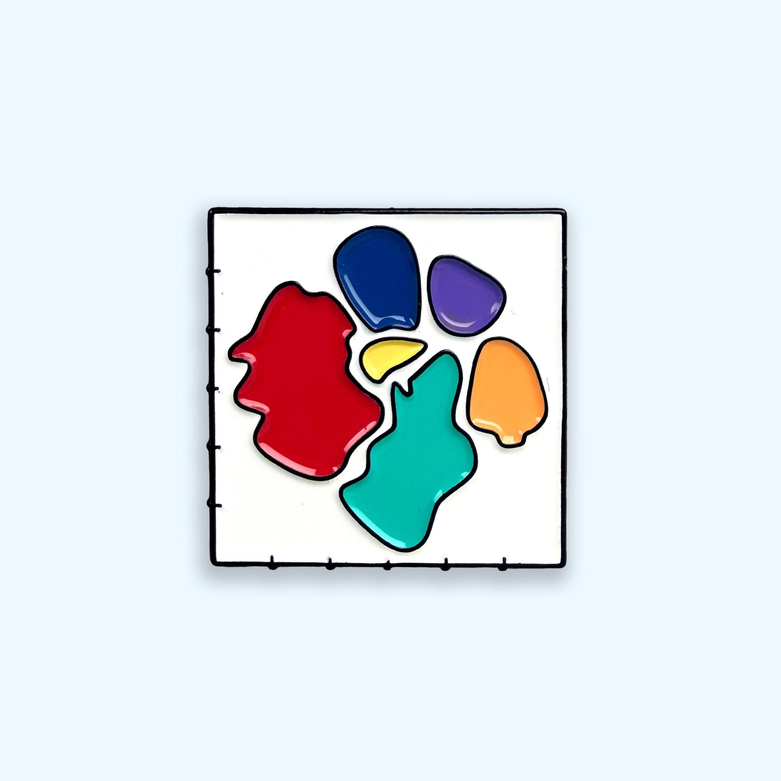t-SNE data plot colourful enamel pin badge on blue background