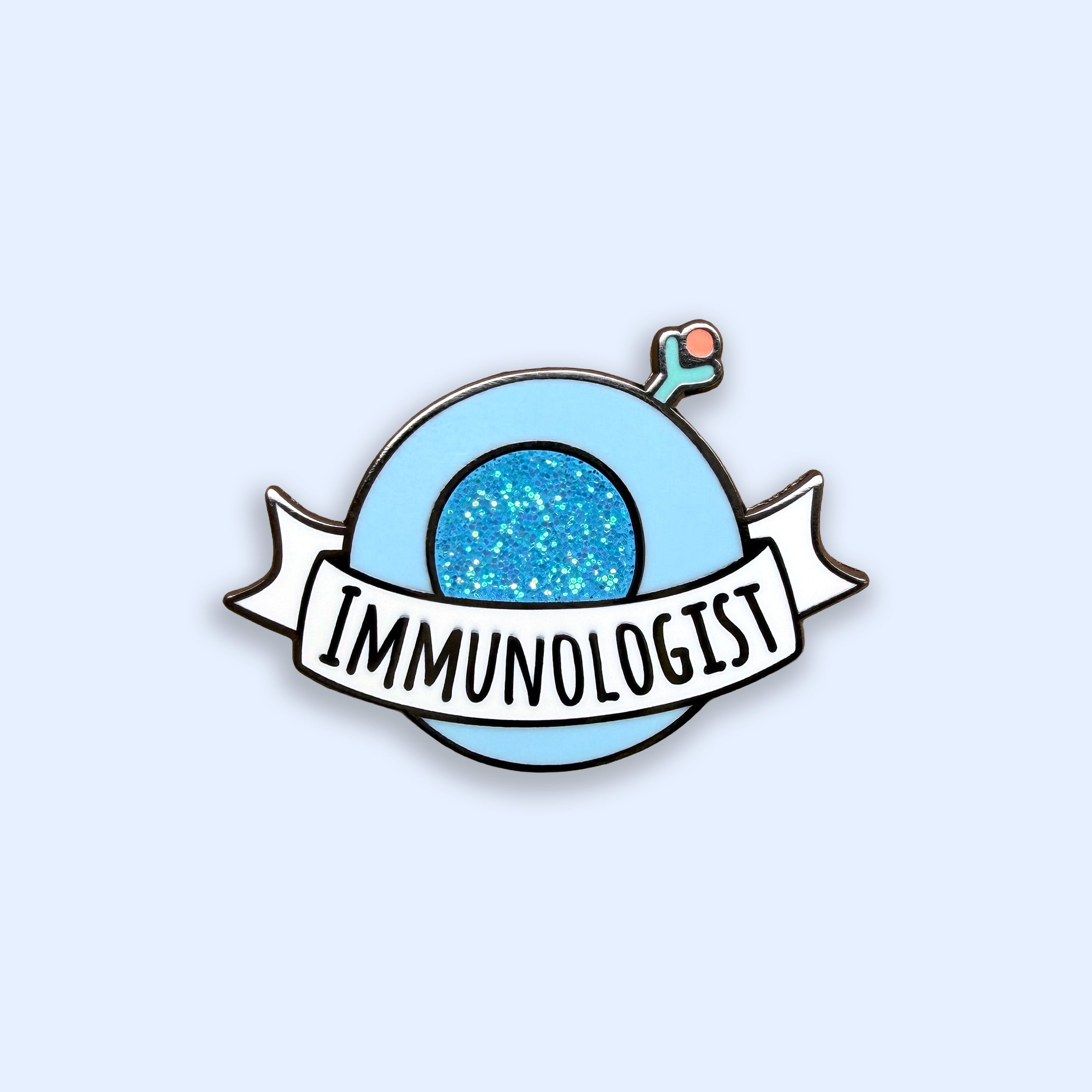 Pin with 'IMMUNOLOGIST' text on a light blue background