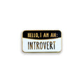 Introvert black and white enamel pin badge on white background