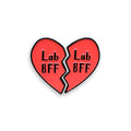 Lab BFF red heart matching enamel pins on white background