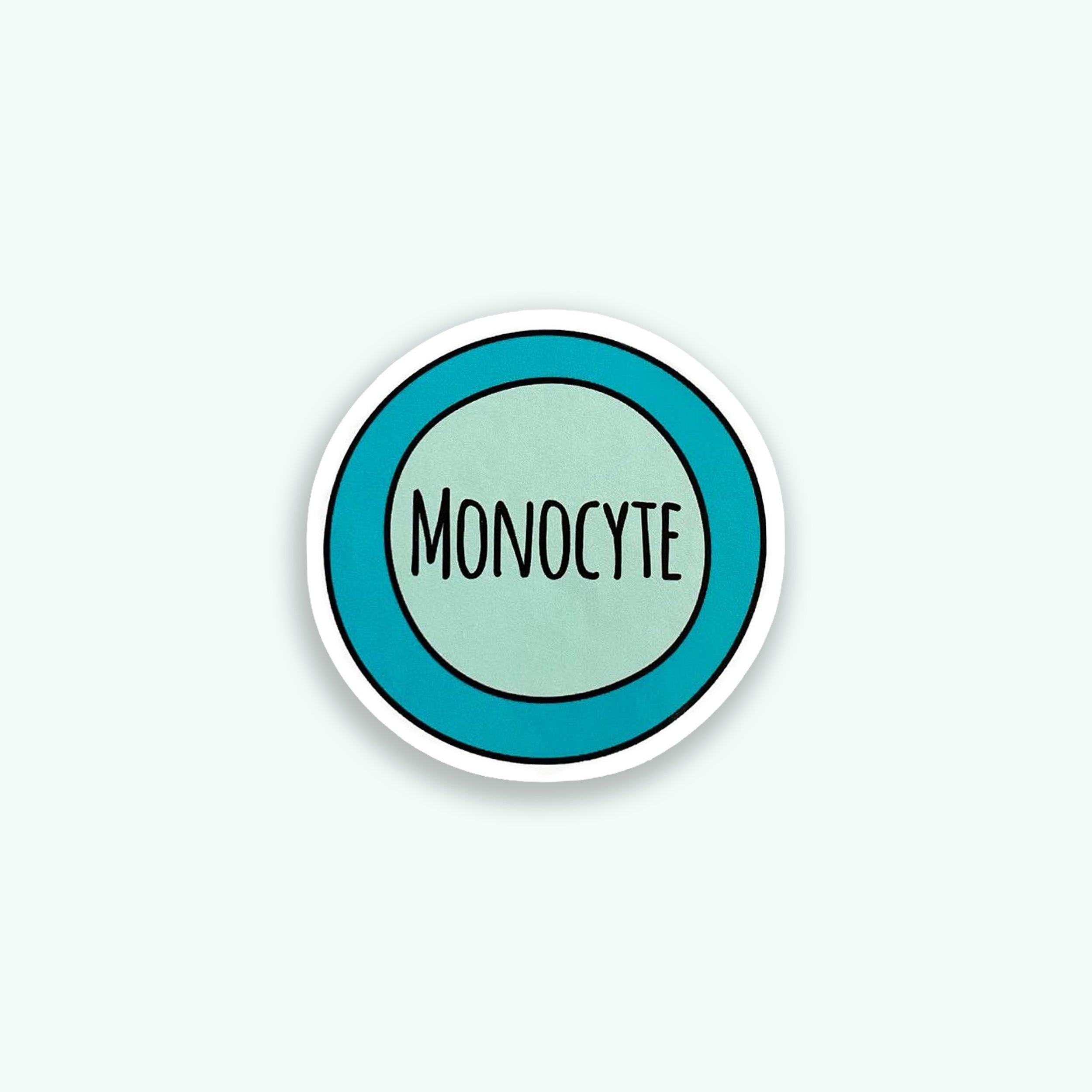 Monocyte colourful vinyl sticker on green background
