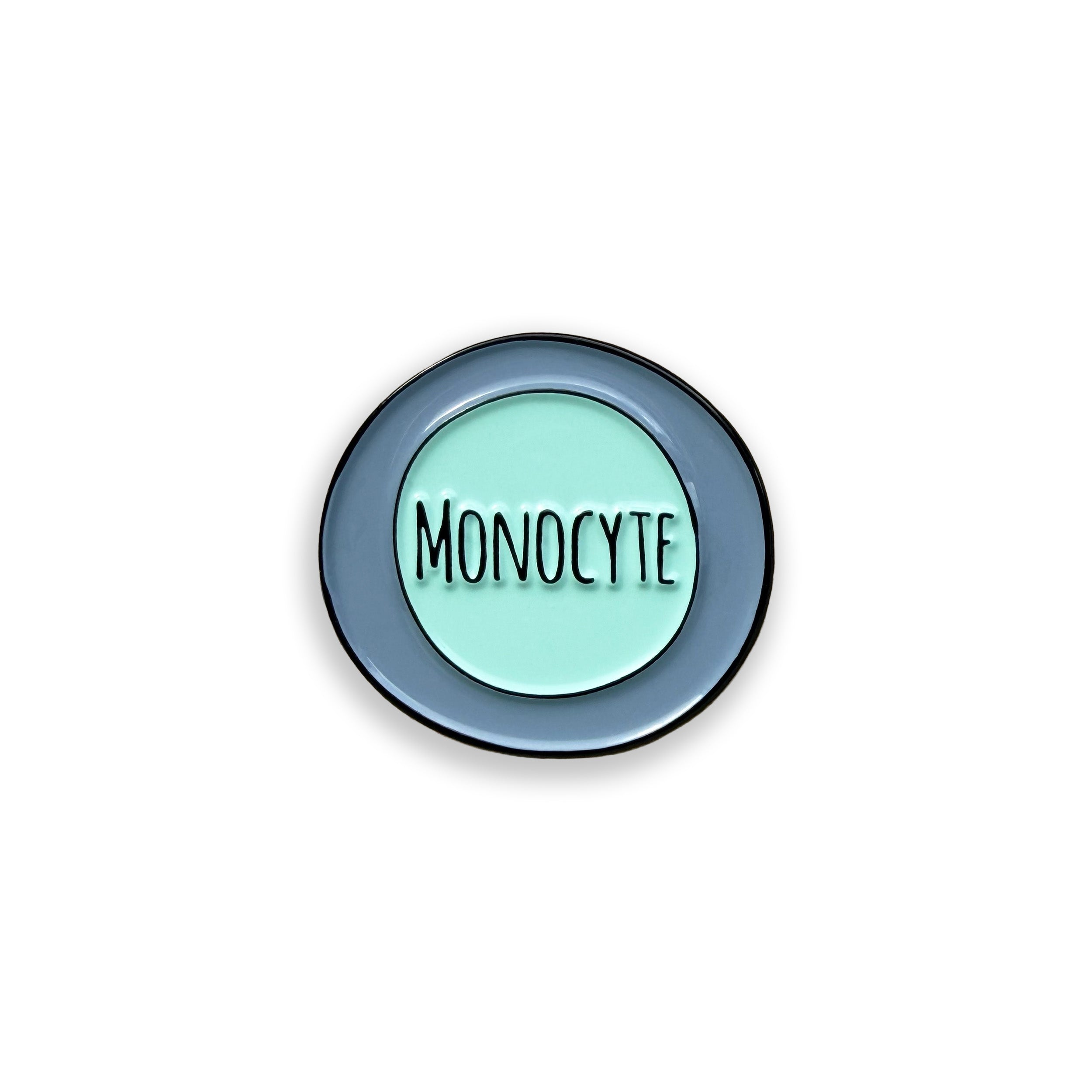 Monocyte blue and green enamel pin badge on white background
