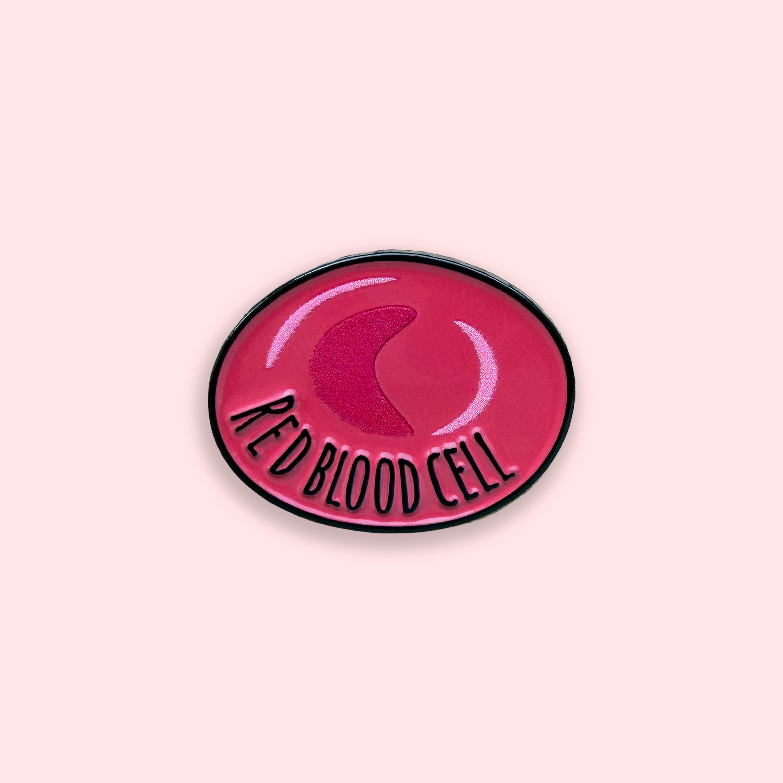 ed blood cell red enamel pin badge on pink background
