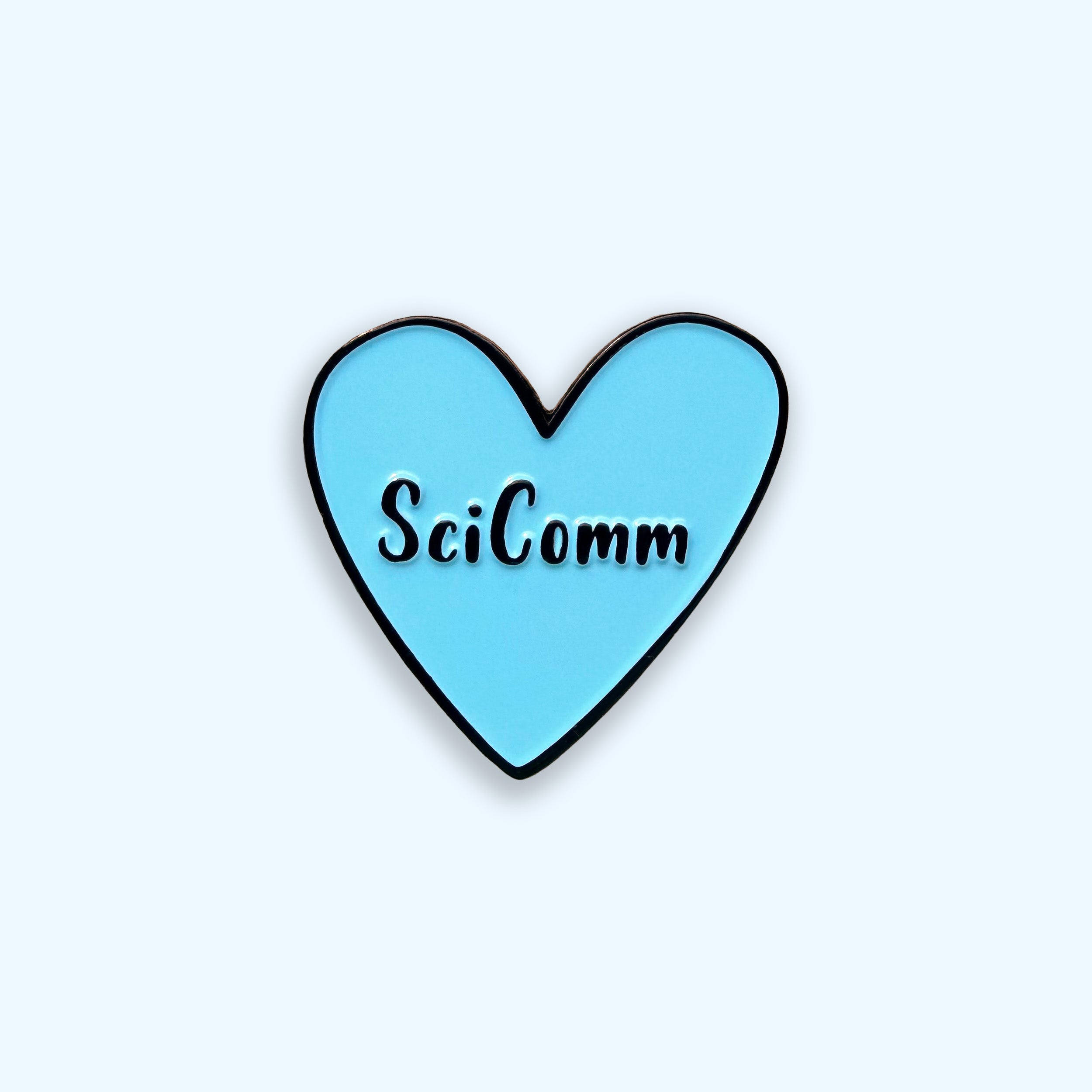 Blue heart-shaped object with 'SciComm' text on a light blue background