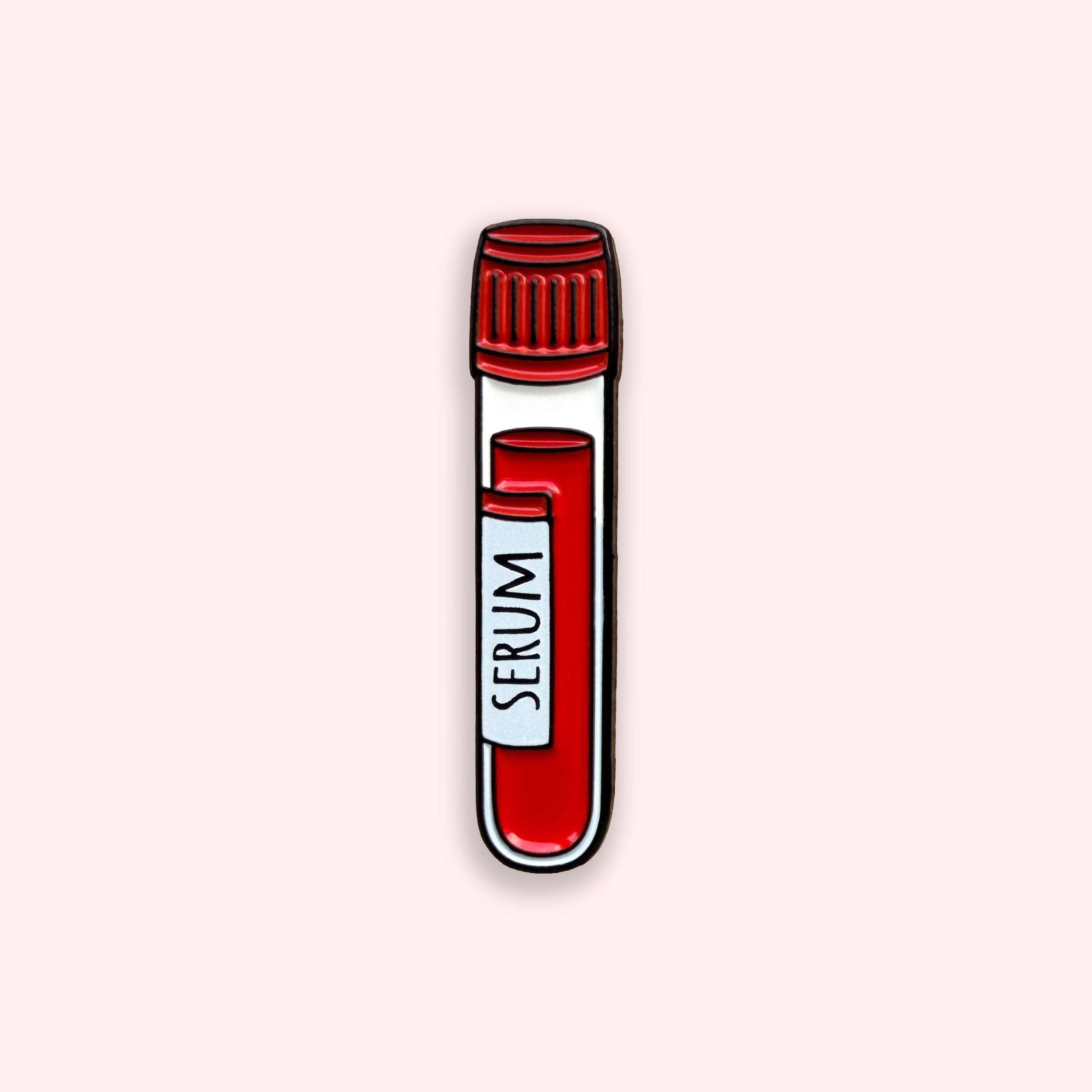 Serum red top blood tube enamel pin badge on pink background