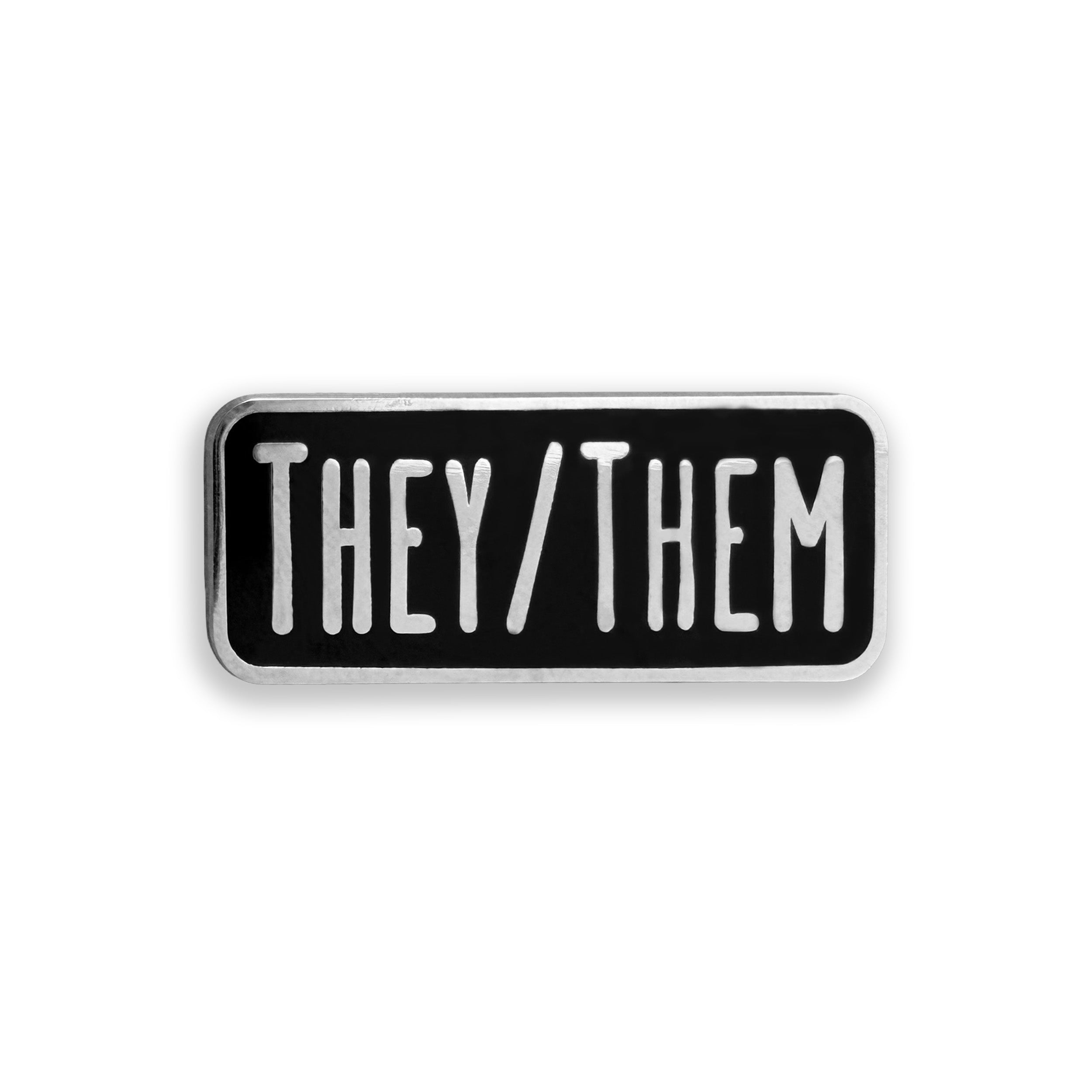 Enamel pin with 'THEY/THEM' text on a white background