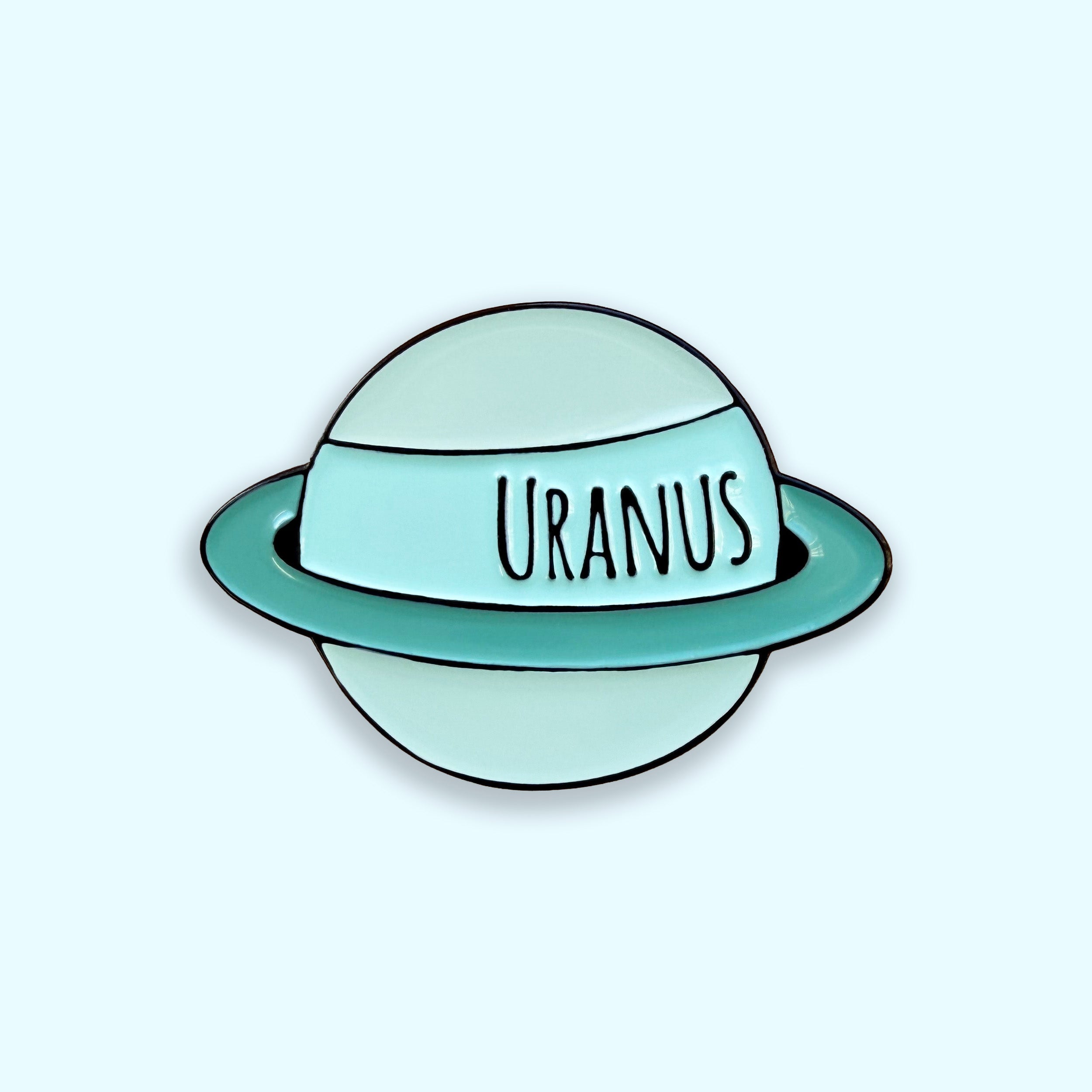 Uranus teal enamel pin badge on blue background