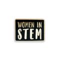 Black and gold 'Women in STEM' enamel pin on a white background